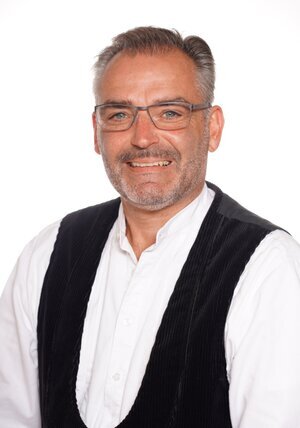 Das Bild zeigt den Obermeister der Zimmerer-Innung Herr Hubertus Wetzenstein